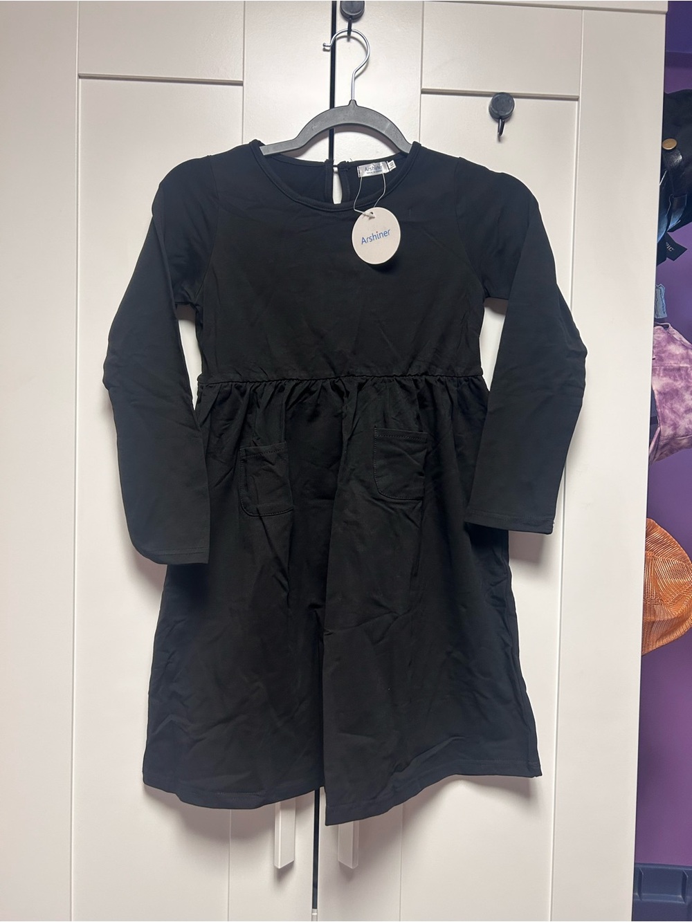 Adorable Black Long-Sleeve Pocket Dress for Girls by Archer